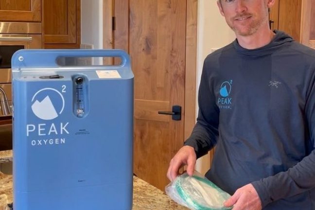 a person standing in a kitchen