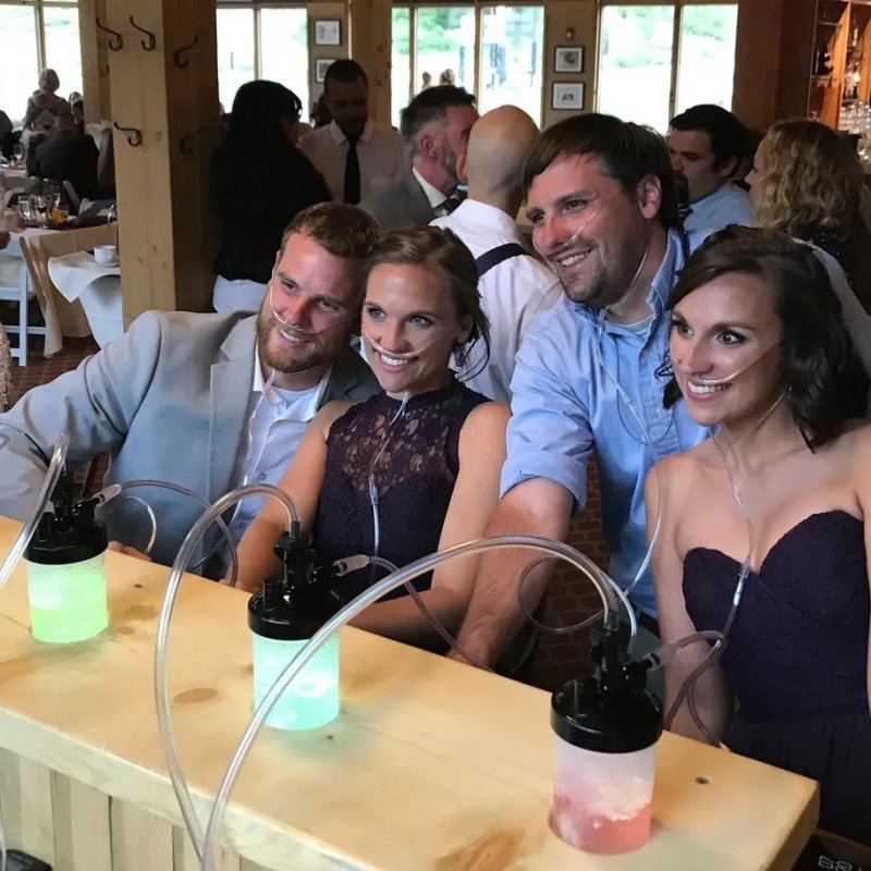 a group of people sitting at a table in a restaurant